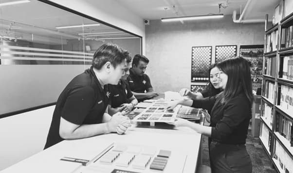 Team members engaged in conversation